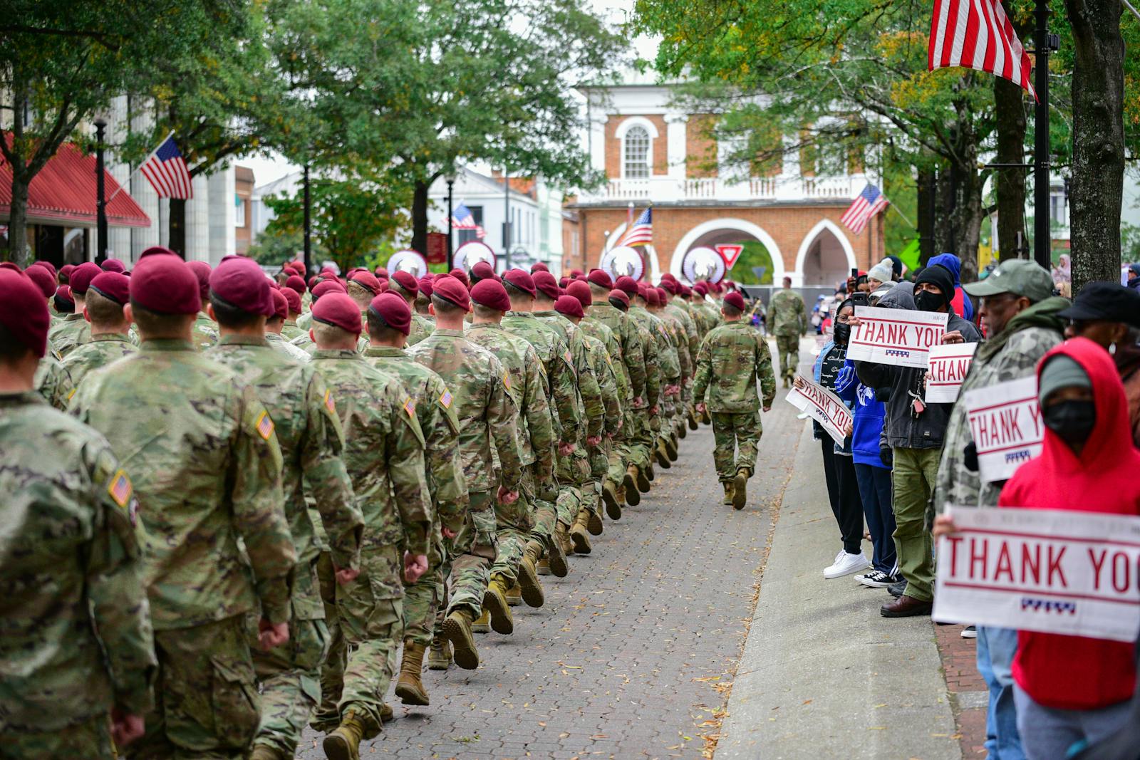 Soldiers marching in a Veterans Day parade near Fort Bragg, North Carolina, where PBT Bancorp helps Veterans buy and refinance homes with VA loans